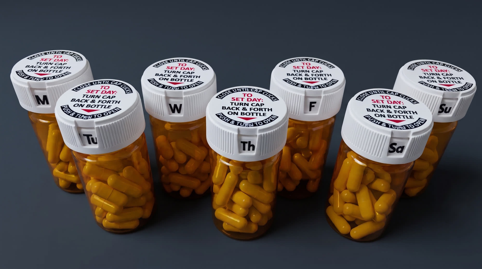 Seven amber prescription bottles, each closed with a RedCap closure showing a different day: M, Tu, W, Th, F, Sa, Su.